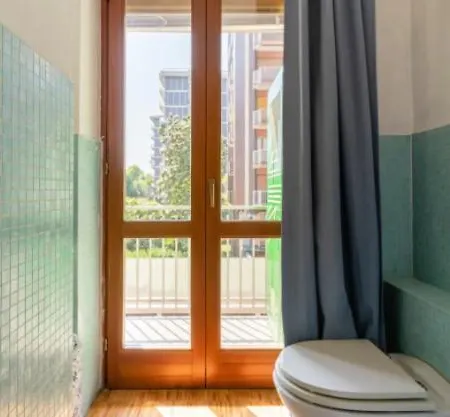 Monolocale industrial-chic di fronte a San Siro Appartamento *